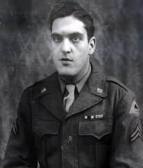 unable to walk due to the bullets in his legs and realizing that he was  slowing the progress of his friends who were carrying him down from the  hill, he urged them