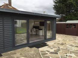 This Beautiful Building Features 4 Pane Upvc Sliding Doors Timber Buildings Summer House Garden Outdoor Gardens Design