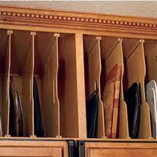 Kitchensource.com has many convenient products to keep your kitchen cabinets organized. Tray Organizers Divide Your Cookie Sheets Pots And Pans Muffin Pans Pizza Trays And More Kitchensource Com