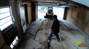 Concrete and garage floors may need repair work done where maintenance access was required, for example where laying down electrical wiring or plumbing pipes. Cat 289d Removing Concrete Garage Floor Youtube