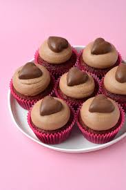 Add the cocoa, red color and vanilla extract and mix again. Red Velvet Cupcakes With Chocolate Frosting Sweetest Menu