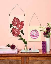 How To Hang An Unframed Poster In Minutes Poster Hanger Hanging Posters Hanging Paintings