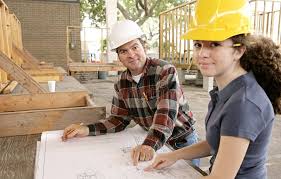 Going Over The Job A Construction Foreman Going Over The Blueprints With A Fema Spon Foreman Construc Stock Images Free Graphic Design Art Stock Photos