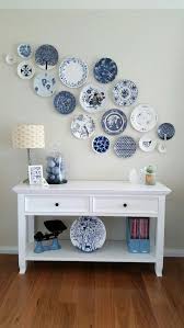 Swirling blue creates a dynamic look for this small glass plate. Plate Wall Plate Wall Decor Plates On Wall Decor