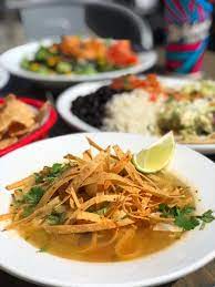 Teriyaki marinated angus steak over rice & beans, garnished with salsa sunset chopped chicken salad charbroiled or blackened chicken, romaine lettuce, avocado, red cabbage, tomato, roasted corn, green onion, cilantro, queso fresco, pepitas and tortilla strips with honey lime vinaigrette Wahoo S Fish Taco On Twitter Our Chicken Tortilla Soup Is Light Brothy And Good Any Time Of Day