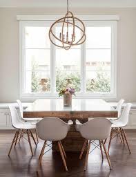 Swag Chandelier Over Dining Table Design Decorating Under Kitchen Table And Chairs Home Decor In 2020 Square Wood Dining Tables Square Dining Tables Dining Room Design
