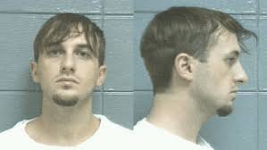 Dead body found in car in Foley