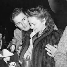 Errol Flynn and Olivia De...