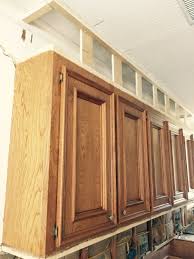 I'll show you how to paint melamine and oak kitchen cabinets and update them with new hardware. How To Make Ugly Cabinets Look Great Designed