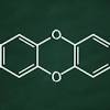 Dioxins consist of two benzene rings connected by two. 1