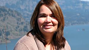 Erin Caputo of ROEM Corporation is a 2016 Woman of Influence