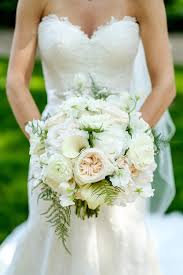 Its a decorative accessory for the image of a girl. Timeless White And Neutral Bridal Bouquet Avant Gardenia