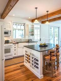 Example of a trendy kitchen design in las vegas with stainless steel appliances i like the far cabinet that has full glass panes and glasses in it for the buffet area. Layout Idea Curved Kitchen Island Curved Kitchen Kitchen Island With Seating