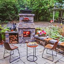 The fireplace features clean, brushed stainless steel faces and stainless. Pacific Northwest Outdoor Living Projects Vulcan Design Construction