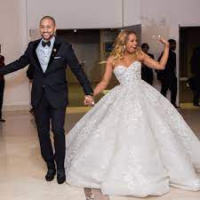 Eva Marcille And Michael Sterling Are Enjoying Their Honeymoon Fans Tell Her They Re One Of The Greatest Rhoa Couples Ball Gowns Wedding Wedding Dresses Beaded Celebrity Wedding Photos