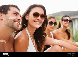 Friends mingling at party hi-res stock photography and images