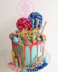 To decorate i used hershey's hugs because of the brown and white stripes. Candy Land Drip Cake With Loads Of Goodies Lolly Cake Drip Cakes Crazy Cakes