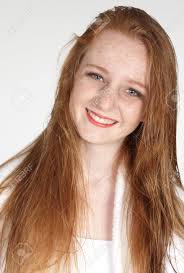Pretty red haired girl with curly hairstyle and elegant make up. Head Shot Of Teen Girl Red Head In A White Robe Stock Photo Picture And Royalty Free Image Image 22310805