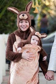 12 Brilliant Celebrity Halloween Costumes Through The Years Baby Halloween Costumes Mother Daughter Halloween Costumes Dog Costumes For Kids