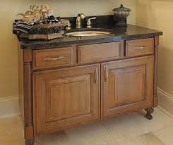 The installation is simple enough that it can be your next do it yourself project. Cherry Bathroom Vanity Decora Cabinetry