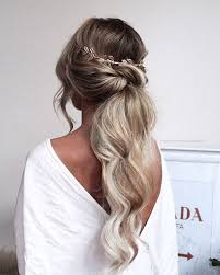 Side braids and ponytails are another chic option to try. 25 Chic Bridal Ponytails To Rock At The Wedding Weddingomania