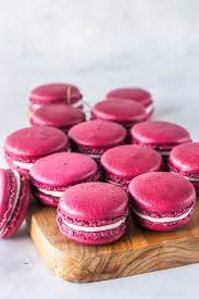 A comprehensive macaron recipe with lots of tips and tricks for perfectly full french macarons. Pomegranate Macarons Pies And Tacos