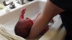 It shows you how to set up the bath and bath your baby. Bathing A Newborn Baby Boy Stock Footage Video 100 Royalty Free 8177509 Shutterstock