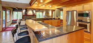 The overall classic look of the design is achieved with light quartz countertops and backsplashes. Dark Or Light Cabinetry How To Choose Granite Countertops In Maryland