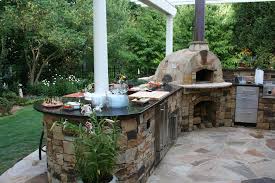 outdoor kitchen and pizza oven, built