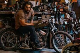 The rocket mortgage commercial starts off normally enough with the actor dodging paparazzi as he. 50 Celebs Who Own Motorcycles The Grizzled Jason Momoa Motorcycle Shop Motorcycle