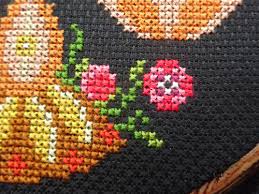 Now take your small circle of felt and place at the back of the work behind where you plan to perfect for little present toppers, tiny tree ornaments or pins. Attic24 Adventures In Cross Stitch