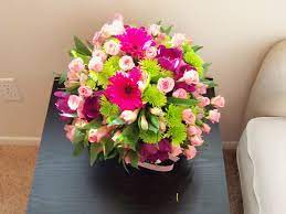 Mini Pink Roses Pink Alstroemeria Hot Pink Gerber Daisies Green Pom Pom And Purple Tulips In A Small Vase Using Purple Tulips Beautiful Bouquet Floral Foam