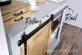 Learn how to install sliding doors you'll learn about the different styles of doors available, how to measure and fit the track, and how to according to instructions, measure and mark the position of the rollers onto the top of your doors. Diy Barn Door Hardware From Washers Ana White