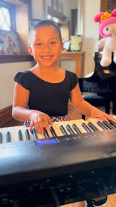 8-year-old Zoe Erianna challenged herself to sing and play I Want You Back  by The Jackson Five!