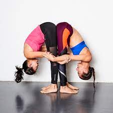 During a couple's yoga flow, you connect physically (sometimes literally holding each other up), stay focused on the moment, and encourage each other's growth. Funny Yoga Poses For Two People Yogawalls