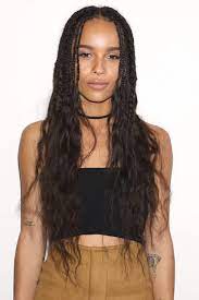 Close Up Shot Of Zoe Kravitz With Curly Box Braids Ends Wearing Black Crop Top And Mustard Skirt Loose Hairstyles Zoe Kravitz Braids Blonde Box Braids