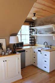 Some may be two levels with the unfinished garage area on the first level and the living space located above. Cute Little Dormer Kitchenette Perfect For A Garage Apartment Or A Tiny Home Kleines Dachzimmer Shabby Chic Kuche Kuchen Rustikal
