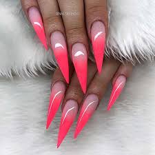 Stiletto nails are oval shaped nails that are more pointed than rounded at the tip, and are usually very long. 12 Gorgeous Pink Ombre Nails Idea Clotee Com