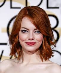 The new colors, however, point to red. Emma Stone Medium Wavy Casual Hairstyle Dark Red Ginger Emma Stone Hair Hairstyles With Bangs Ginger Hair