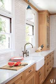 Mindy Kaling S Los Angeles Home Is Just As Cheerful As She Is Kitchen Renovation Light Wood Kitchens New Kitchen Cabinets