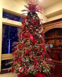 Brown Gold And Red Color Ribbons Mixed With Animal Print It Looks Very Elegant In Christmas Tree Decorations Ribbon On Christmas Tree Christmas Tree Toppers