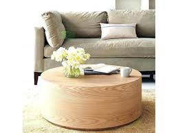 A rich, waxy finish enhances the wood's tonal variation for a look sure to entice. Wood Drum Style Coffee Table Apartment Therapy S Bazaar Coffee Table Round Wood Coffee Table Living Room Table