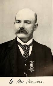 Edwin M. Monroe (1838-19320 Contractor-builder, Sexton of Riverside  Cemetery, originally from Mount Clemons, Michigan, came to Ironwood in 1887  from New York state. Corporal in the Michigan Infantry, Union Army, veteran  of