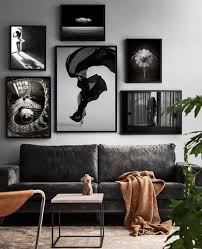 A simple palette dominated by black and white gives off a sleek, modern vibe. How To Style A Living Room With Grey Walls And Grey Furniture Decoholic