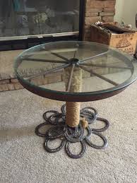 Horse Shoe Wagon Wheel Table Extreme Metal Works Wagon Wheel Table Wagon Wheel Wagon Wheel Decor