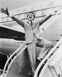 Telling stories over his acoustic guitar, modugno was. Domenico Modugno Bursts Into Song Photograph By Bettmann