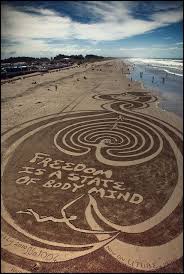 Balance, energy, harmony, strength and growth through yoga. Sand Art On Brighton Beach Christchurch New Sand Art Beach Art Land Art