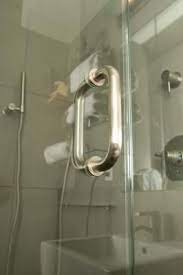 How To Get Water Spots Off Of A Shower Door Hunker Glass Shower Shower Door Cleaner Clean Shower Doors