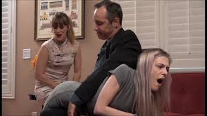 Violet Takes Nikkis Spanking For Her - oSpank.com