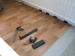 Laminate flooring can give you a realistic looking of wood, tile or stone appearance without the hustle of cleaning soiled grout joints. Unika Diy And Engineered Floor Fitting Kit Flooring Engineered Parquet Laminate